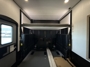 queen-over-sofas-in-garage