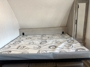 living-atea-with-bed-down