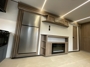 fridge-fireplace-bunk-room-door