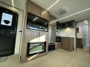 closet-tv-fireplace-kitchen