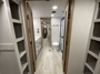 closet-space-facing-bathroom